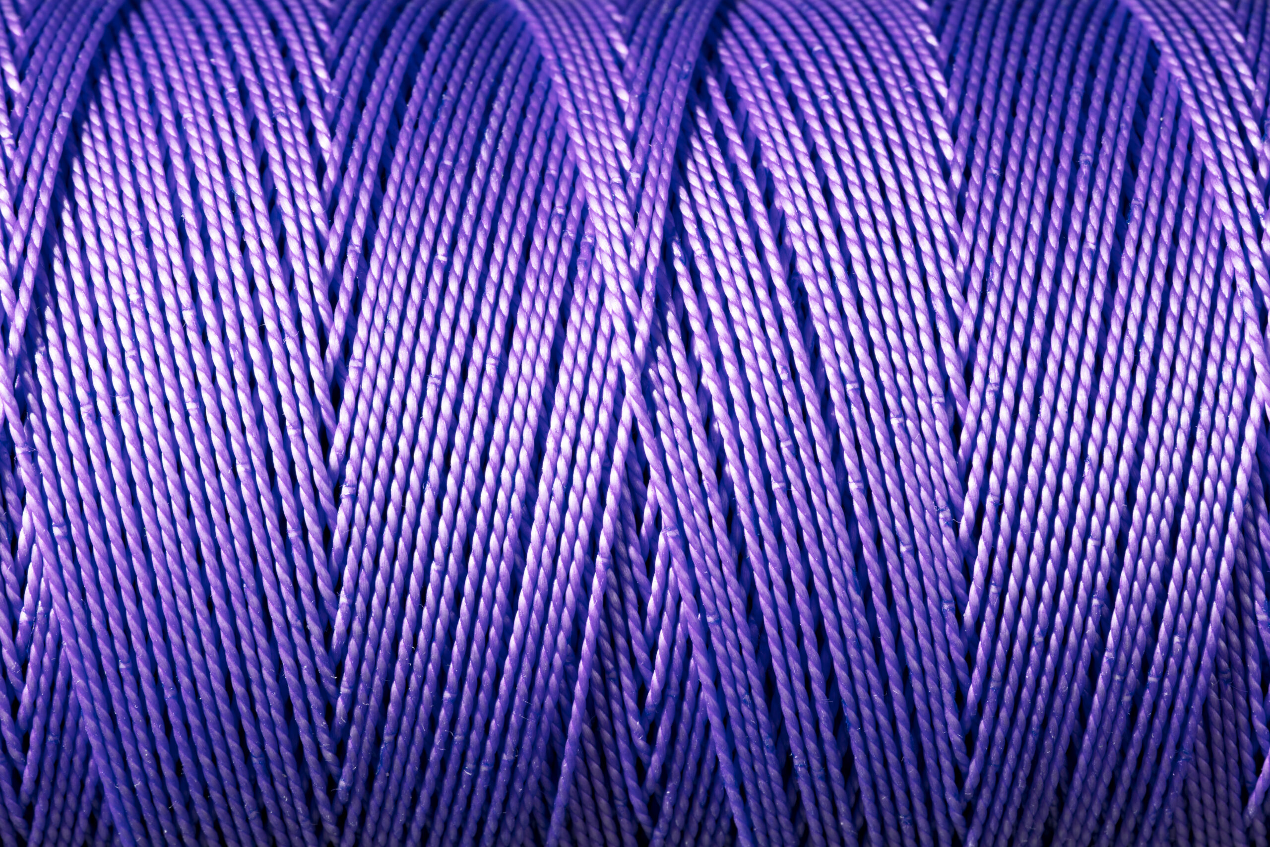 Purple Nylon String Spool Texture Background